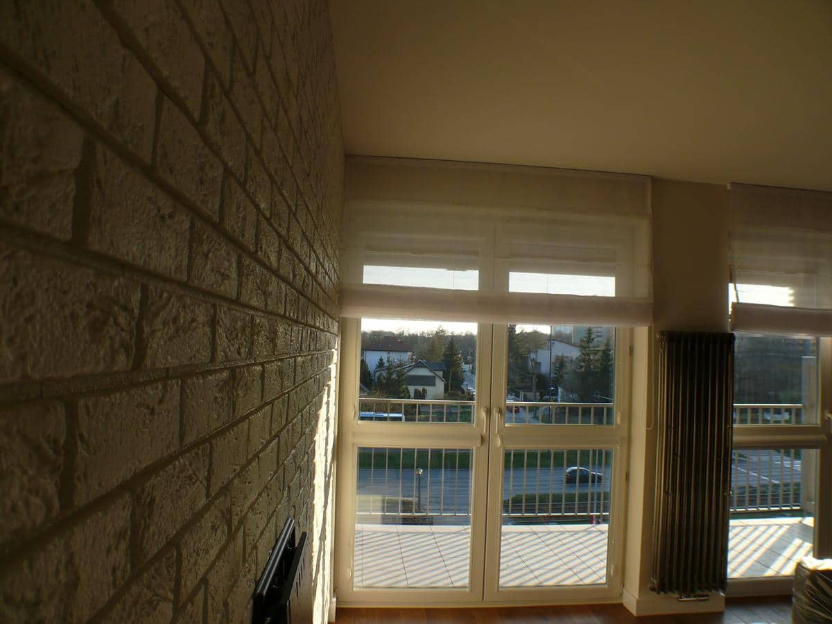 Projekt wnętrz apartamentu z wykonaniem - ściana z cegły